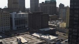 5.7K aerial stock footage descend while focused on office building, Downtown Memphis, Tennessee Aerial Stock Footage | DX0002_184_034