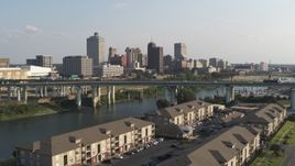 5.7K aerial stock footage of the city's skyline and bridge seen from apartment buildings, Downtown Memphis, Tennessee Aerial Stock Footage | DX0002_185_003