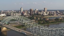 5.7K aerial stock footage focus on skyline while descending by the bridge, Downtown Memphis, Tennessee Aerial Stock Footage | DX0002_185_007