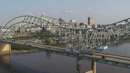 5.7K aerial stock footage of a stationary view of traffic crossing the bridge near Downtown Memphis, Tennessee Aerial Stock Footage | DX0002_185_008