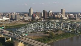 5.7K aerial stock footage ascend past bridge for view of the skyline, Downtown Memphis, Tennessee Aerial Stock Footage | DX0002_185_011