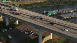 5.7K aerial stock footage of cars and trucks on the bridge in Memphis, Tennessee Aerial Stock Footage | DX0002_185_016