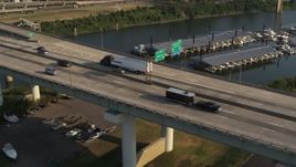 5.7K aerial stock footage of a static view of cars and trucks on the bridge in Memphis, Tennessee Aerial Stock Footage | DX0002_185_018
