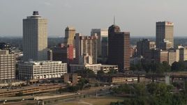 5.7K aerial stock footage of a reverse view of the skyline at sunset, Downtown Memphis, Tennessee Aerial Stock Footage | DX0002_185_027