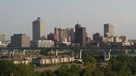 5.7K aerial stock footage of the downtown skyline at sunset, seen from apartment buildings, Downtown Memphis, Tennessee Aerial Stock Footage | DX0002_185_033