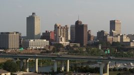 5.7K aerial stock footage ascend over the bridge toward the downtown skyline at sunset, Downtown Memphis, Tennessee Aerial Stock Footage | DX0002_185_034