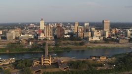 5.7K aerial stock footage of a wide orbit around the downtown skyline at sunset, Downtown Memphis, Tennessee Aerial Stock Footage | DX0002_186_004