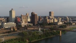 5.7K aerial stock footage of circling the downtown skyline at sunset, Downtown Memphis, Tennessee Aerial Stock Footage | DX0002_186_006