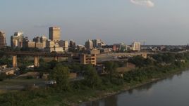 5.7K aerial stock footage circling the riverfront museum at sunset, Downtown Memphis, Tennessee Aerial Stock Footage | DX0002_186_016