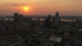 5.7K aerial stock footage orbit the city skyline and the setting sun, Downtown Memphis, Tennessee Aerial Stock Footage | DX0002_186_026