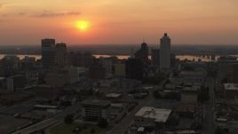 5.7K aerial stock footage orbit the downtown skyline and the setting sun, Downtown Memphis, Tennessee Aerial Stock Footage | DX0002_186_027