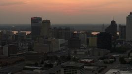 5.7K aerial stock footage of the skyline as the setting sun disappears in the sky, Downtown Memphis, Tennessee Aerial Stock Footage | DX0002_186_035