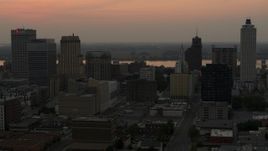 5.7K aerial stock footage an orbit of the office towers of the skyline at sunset, Downtown Memphis, Tennessee Aerial Stock Footage | DX0002_186_036