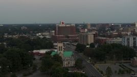 5.7K aerial stock footage of circling a hospital at twilight in Memphis, Tennessee Aerial Stock Footage | DX0002_186_044