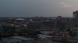 5.7K aerial stock footage of city buildings and FedEx Forum at twilight, Downtown Memphis, Tennessee Aerial Stock Footage | DX0002_187_001