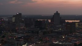 5.7K aerial stock footage of an orbit of the city's downtown skyline at twilight, Downtown Memphis, Tennessee Aerial Stock Footage | DX0002_187_007