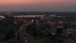 5.7K aerial stock footage an orbit of the Memphis Pyramid at twilight, Downtown Memphis, Tennessee Aerial Stock Footage | DX0002_187_014