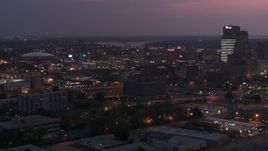 5.7K aerial stock footage of an orbit of AutoZone Park baseball stadium at twilight, Downtown Memphis, Tennessee Aerial Stock Footage | DX0002_187_016