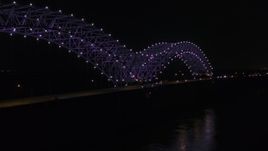 5.7K aerial stock footage of orbiting the bridge with purple lights at night, Memphis, Tennessee Aerial Stock Footage | DX0002_187_030