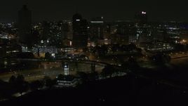 5.7K aerial stock footage approach and orbit the city's downtown skyline at night, Downtown Memphis, Tennessee Aerial Stock Footage | DX0002_187_060