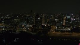 5.7K aerial stock footage orbit office tower and downtown skyline at night, Downtown Memphis, Tennessee Aerial Stock Footage | DX0002_187_062