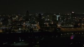 5.7K aerial stock footage an orbit of the downtown skyline at night, Downtown Memphis, Tennessee Aerial Stock Footage | DX0002_187_063
