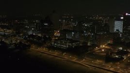 5.7K aerial stock footage of orbiting the skyline at nighttime, Downtown Memphis, Tennessee Aerial Stock Footage | DX0002_187_074
