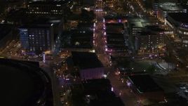 5.7K aerial stock footage of a view down Beale Street at nighttime, Downtown Memphis, Tennessee Aerial Stock Footage | DX0002_188_005