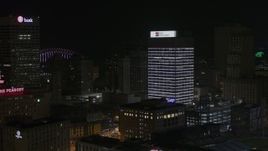 5.7K aerial stock footage of slowly approaching First Tennessee Building at nighttime, Downtown Memphis, Tennessee Aerial Stock Footage | DX0002_188_025