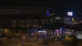 5.7K aerial stock footage of an orbit of the Beale Street sign at nighttime, Downtown Memphis, Tennessee Aerial Stock Footage | DX0002_188_028