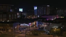 5.7K aerial stock footage of a static view of the Beale Street sign at nighttime, Downtown Memphis, Tennessee Aerial Stock Footage | DX0002_188_032