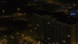 5.7K aerial stock footage ascend by an office building at nighttime, Memphis, Tennessee Aerial Stock Footage | DX0002_188_046