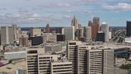 5.7K aerial stock footage fly away skyline, reveal apartment towers, Downtown Detroit, Michigan Aerial Stock Footage | DX0002_189_012