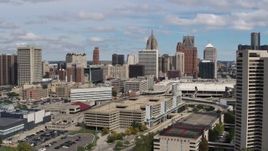 5.7K aerial stock footage of flying by the city's skyline, Downtown Detroit, Michigan Aerial Stock Footage | DX0002_189_013