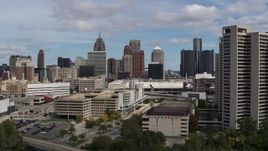5.7K aerial stock footage ascend for a view of the skyline, Downtown Detroit, Michigan Aerial Stock Footage | DX0002_189_021