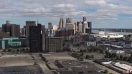 5.7K aerial stock footage ascend for a view of the skyline, Downtown Detroit, Michigan Aerial Stock Footage | DX0002_189_029