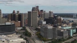 5.7K aerial stock footage view of federal building while flying by hotel, Downtown Detroit, Michigan Aerial Stock Footage | DX0002_190_008