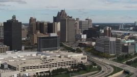 5.7K aerial stock footage fly away from federal building and hotel, Downtown Detroit, Michigan Aerial Stock Footage | DX0002_190_009
