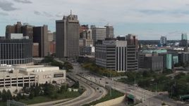 5.7K aerial stock footage of circling the downtown police headquarters, Downtown Detroit, Michigan Aerial Stock Footage | DX0002_190_015