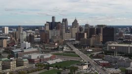 5.7K aerial stock footage the towering skyscrapers in the city's skyline, Downtown Detroit, Michigan Aerial Stock Footage | DX0002_190_017