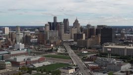 5.7K aerial stock footage a wide view of the towering skyscrapers in the city's skyline, Downtown Detroit, Michigan Aerial Stock Footage | DX0002_190_018