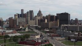 5.7K aerial stock footage descend near Grand River Avenue, view of the city's skyline, Downtown Detroit, Michigan Aerial Stock Footage | DX0002_190_034