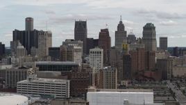 5.7K aerial stock footage a view over rooftops of the city's skyline, Downtown Detroit, Michigan Aerial Stock Footage | DX0002_190_037