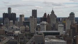 5.7K aerial stock footage ascend and flyby the city's downtown skyline, Downtown Detroit, Michigan Aerial Stock Footage | DX0002_190_039