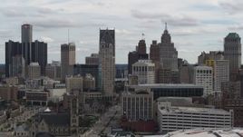 5.7K aerial stock footage the city's downtown skyline seen from over the arena, Downtown Detroit, Michigan Aerial Stock Footage | DX0002_190_041