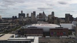 5.7K aerial stock footage flyby the city's downtown skyline and arena, Downtown Detroit, Michigan Aerial Stock Footage | DX0002_191_001
