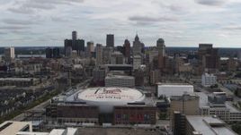 5.7K aerial stock footage a wide view of the city's downtown skyline and arena, Downtown Detroit, Michigan Aerial Stock Footage | DX0002_191_002