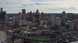 5.7K aerial stock footage of approaching Comerica Park baseball stadium and skyline, Downtown Detroit, Michigan Aerial Stock Footage | DX0002_191_014