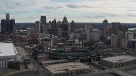 5.7K aerial stock footage fly toward Comerica Park baseball stadium and skyline, Downtown Detroit, Michigan Aerial Stock Footage | DX0002_191_017