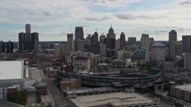 5.7K aerial stock footage descend with view of baseball stadium and skyline, Downtown Detroit, Michigan Aerial Stock Footage | DX0002_191_018